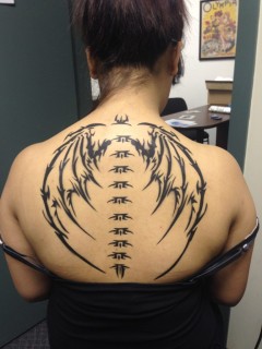 Demon wings airbrush tattoo